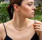 Gold and green crystal accented cactus drop earrings