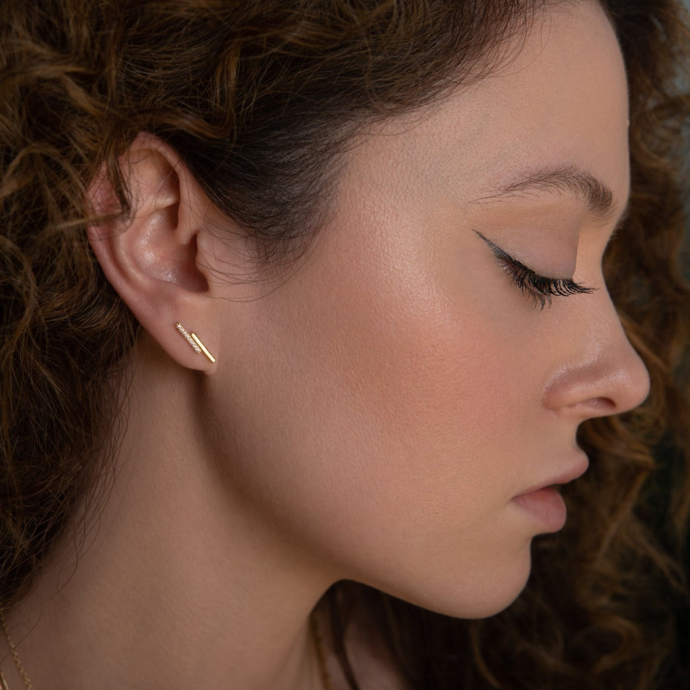 model wearing Gold & Crystal double bar minimalist earrings