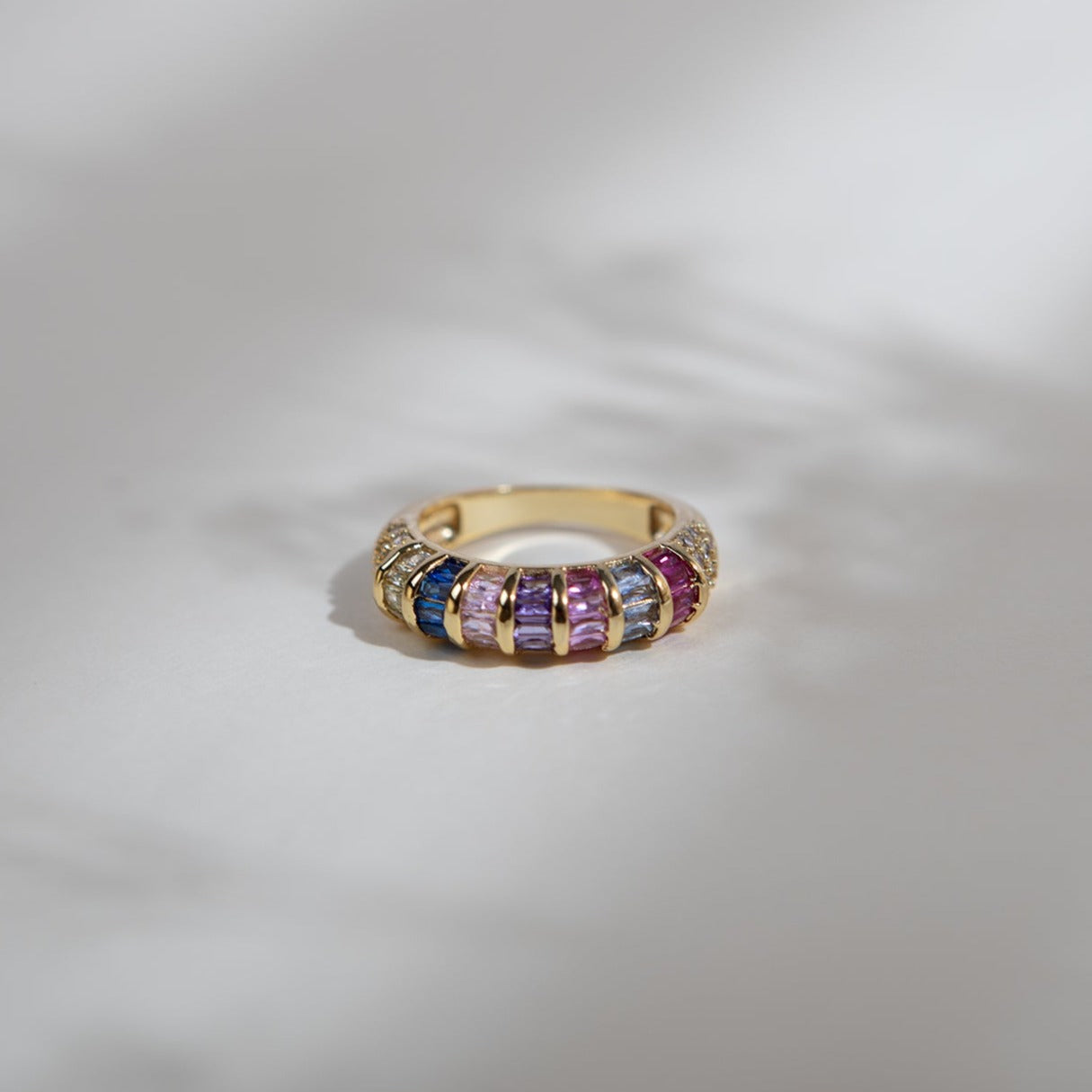 Multi-coloured baguette crystal and gold rings