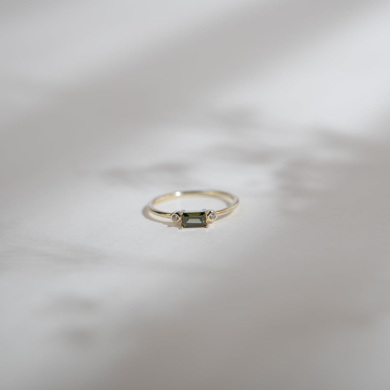 peridot coloured crystal and gold ring