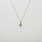 Gold chain with pink  and white crystal accented flamingo pendant