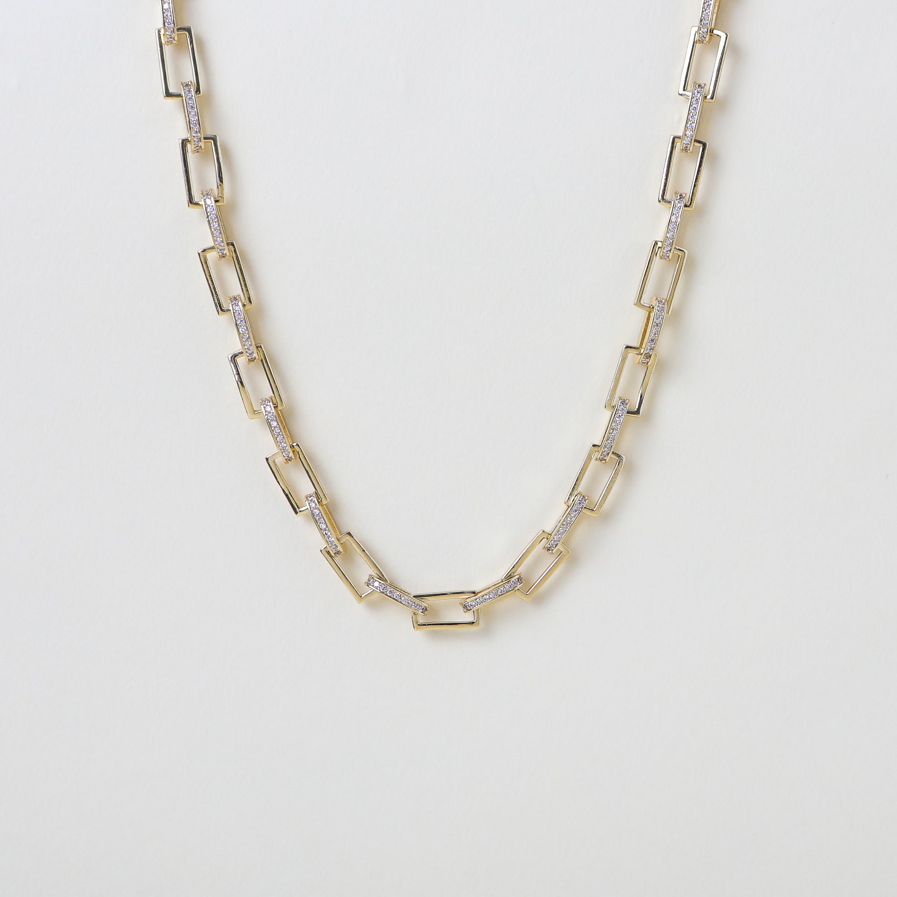 Gold necklace with square chunky pave set links