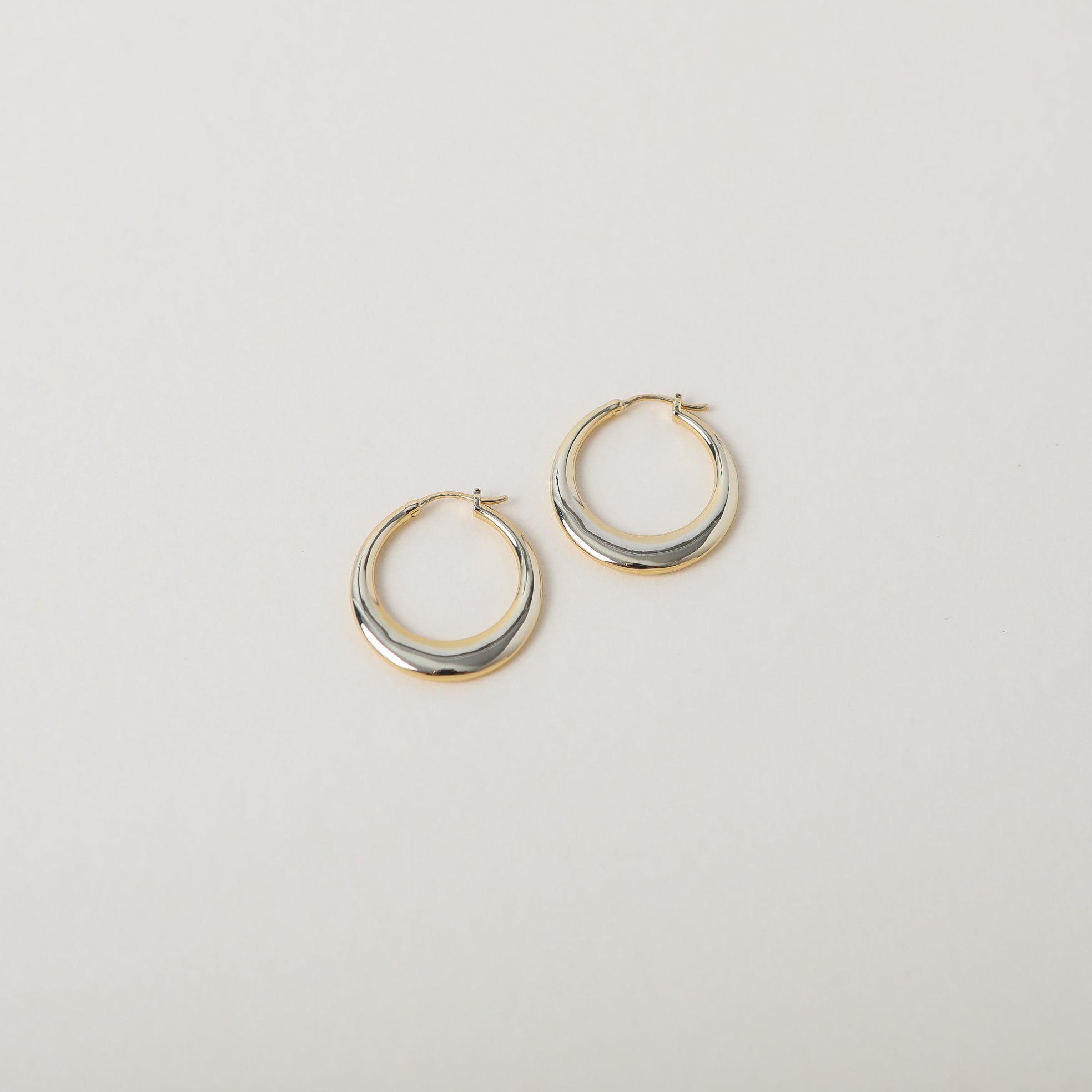 Gold geometric bag hoop earrings