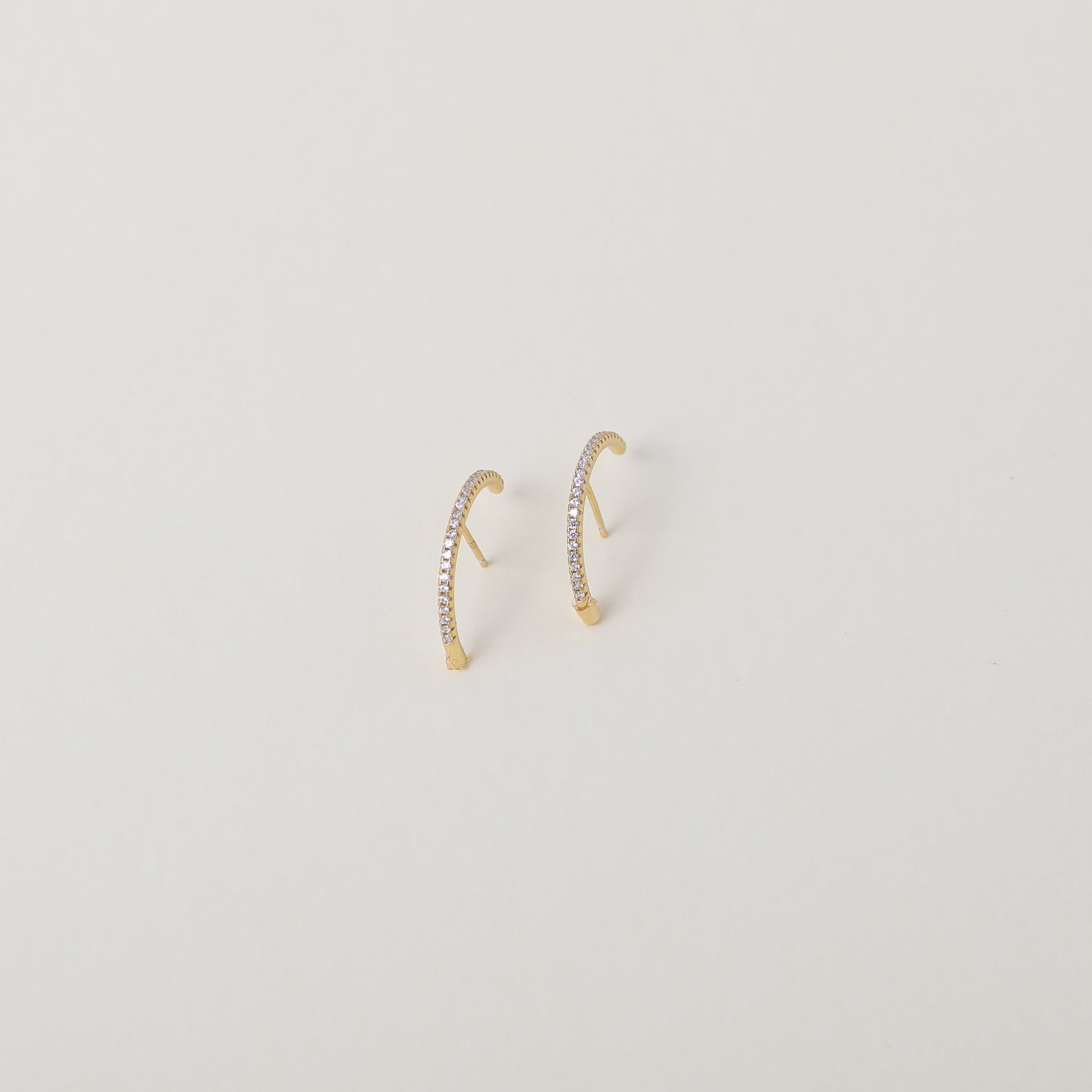 Crystal accented gold lunar ear cuffs