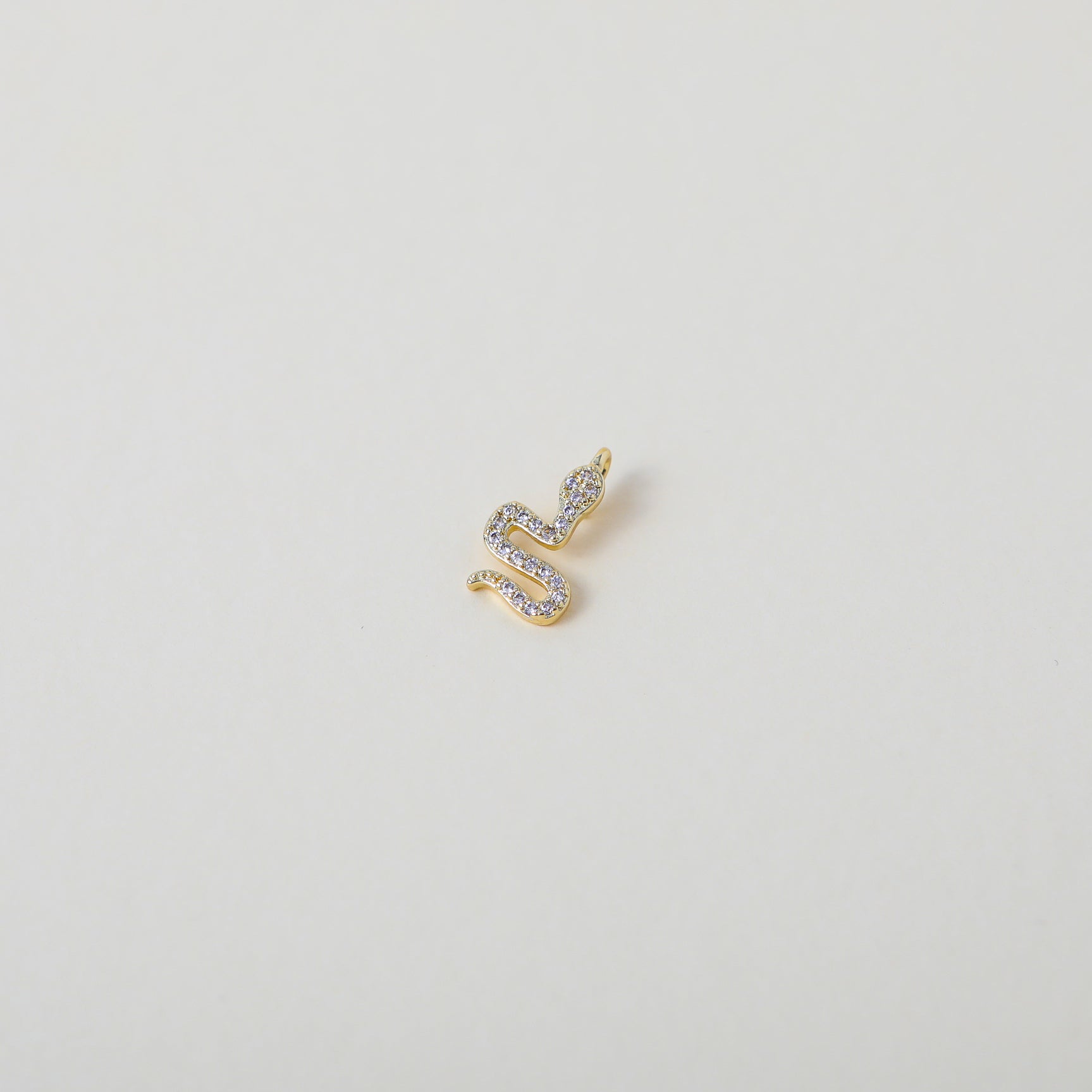 Gold and crystal accented snake charm