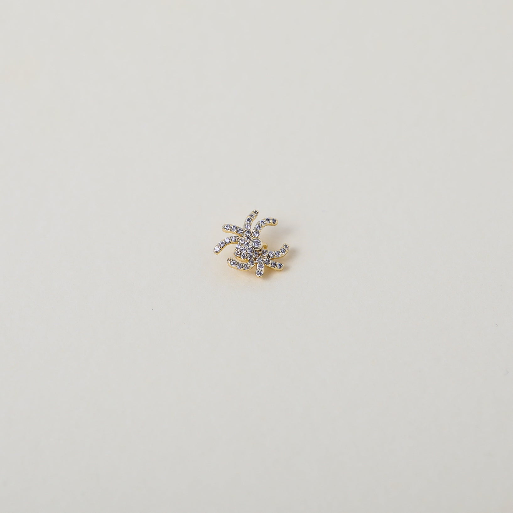 Gold and crystal accented spider charm