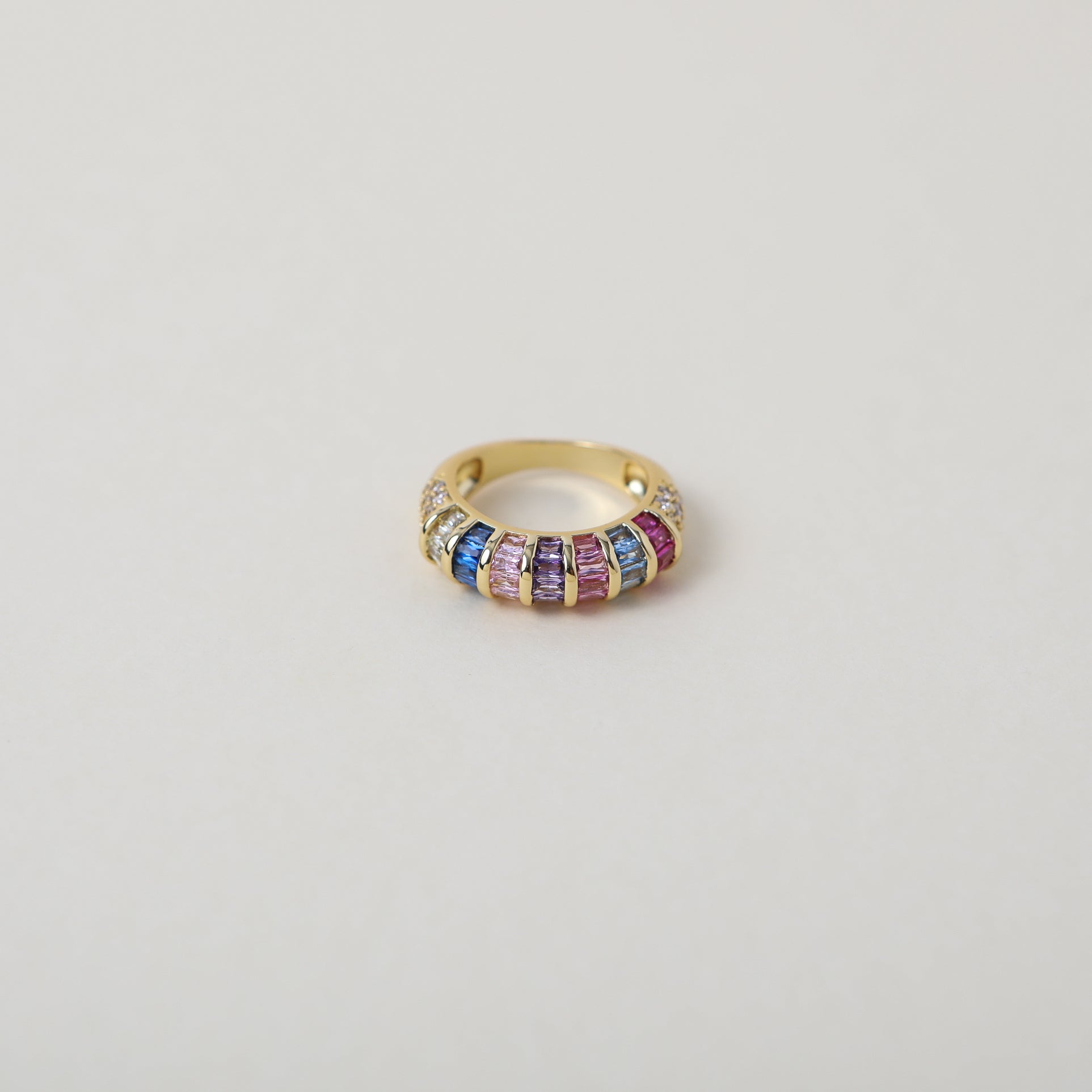 Multi-coloured baguette crystal and gold rings