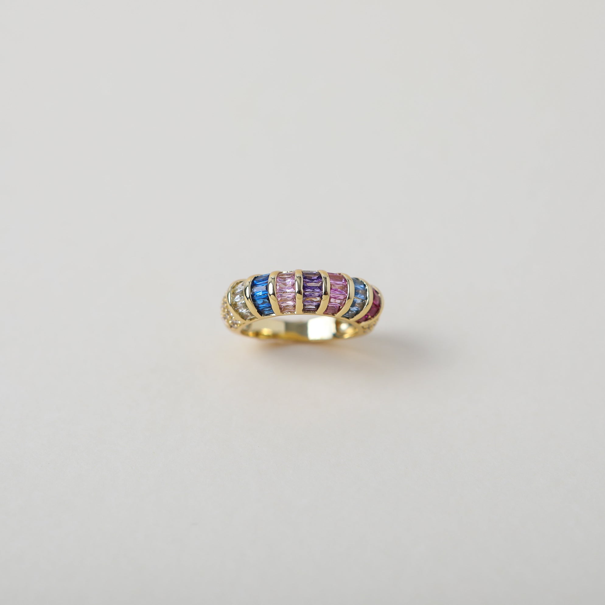 Multi-coloured baguette crystal and gold rings