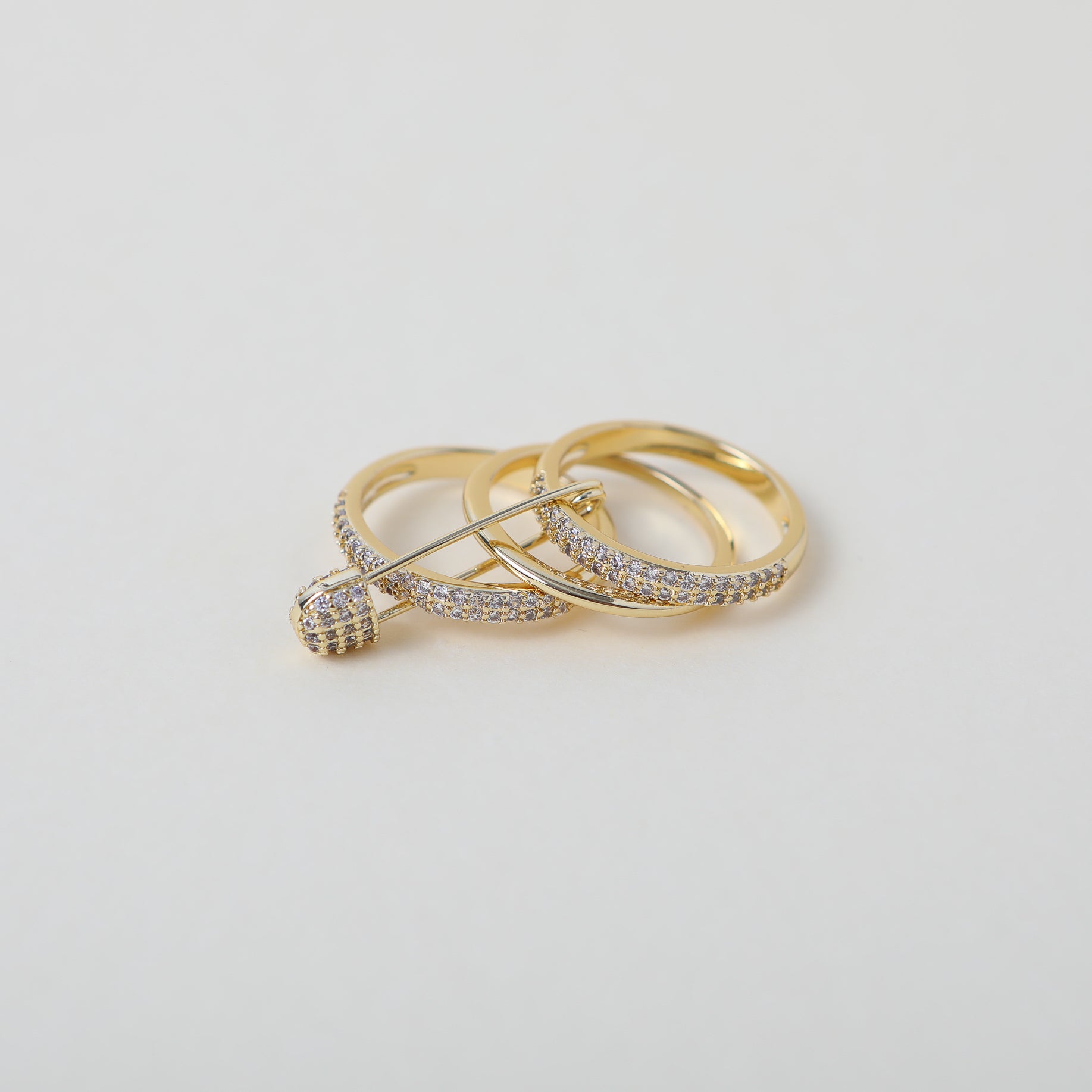 Stackable gold and crystal accented safety pin rings