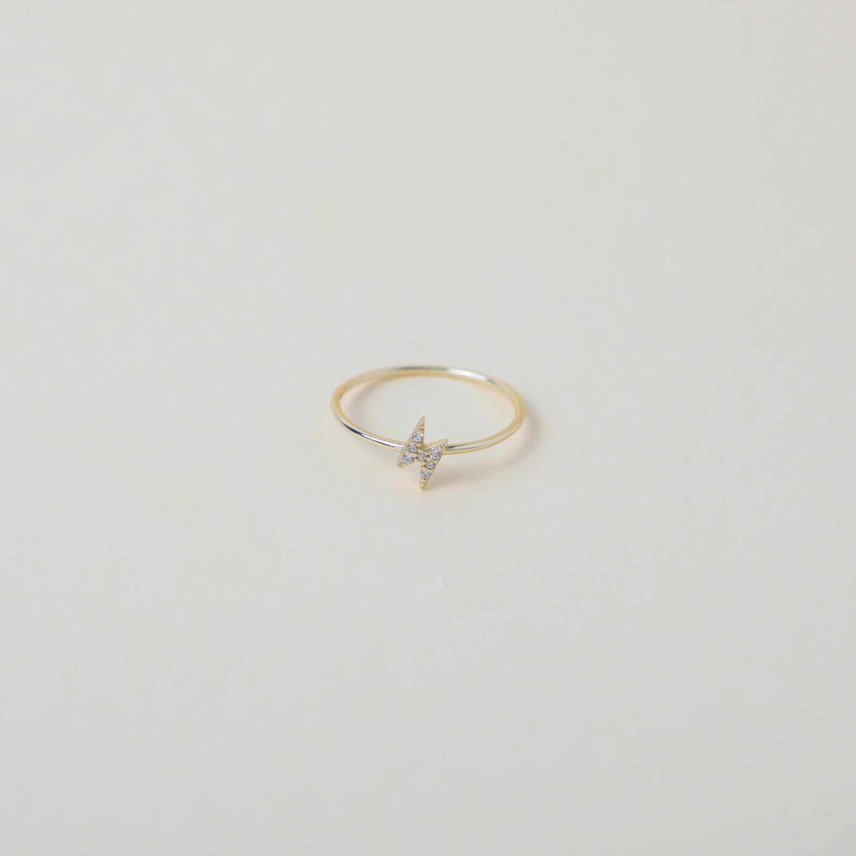 gold crystal accented lightening bold ring