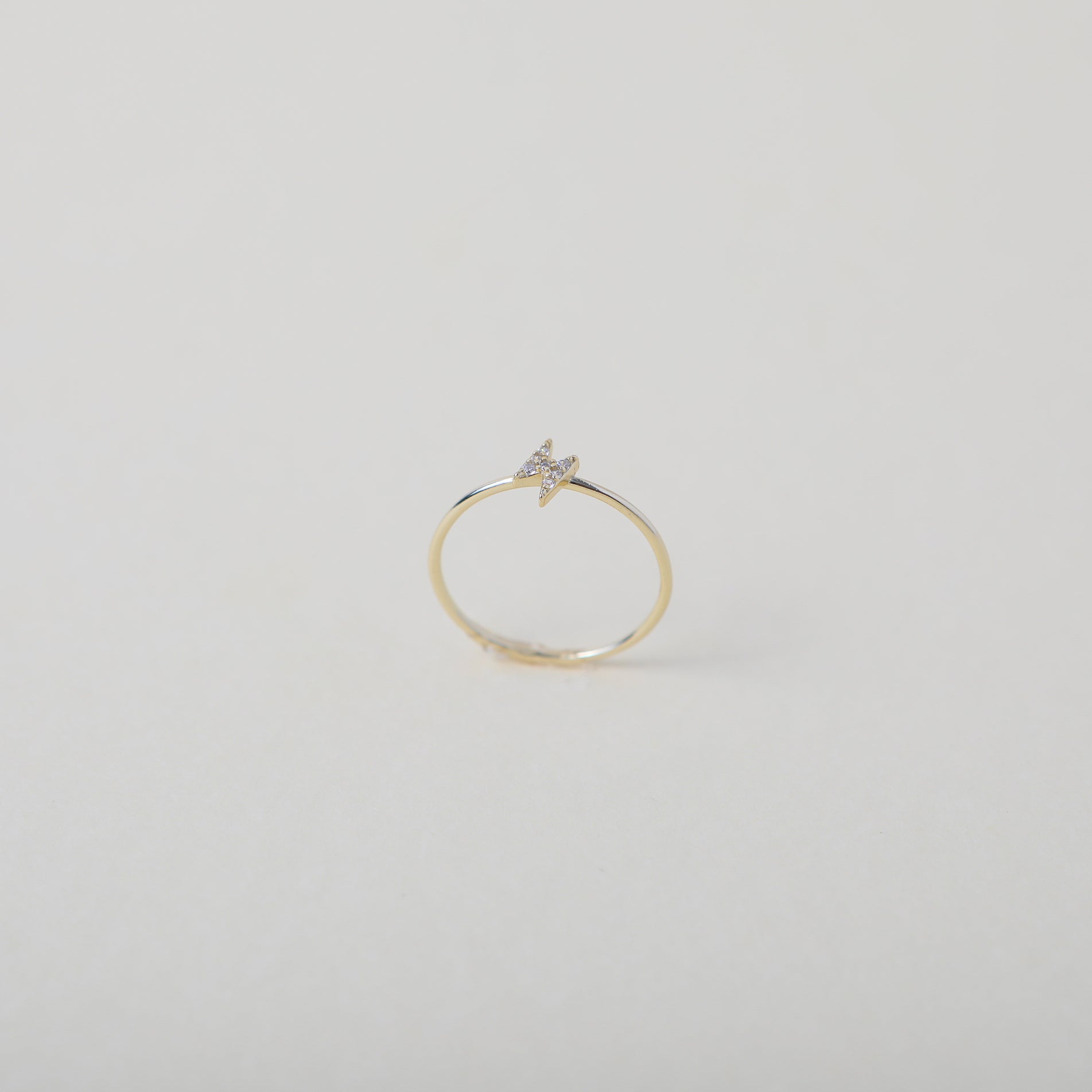 gold crystal accented lightening bold ring