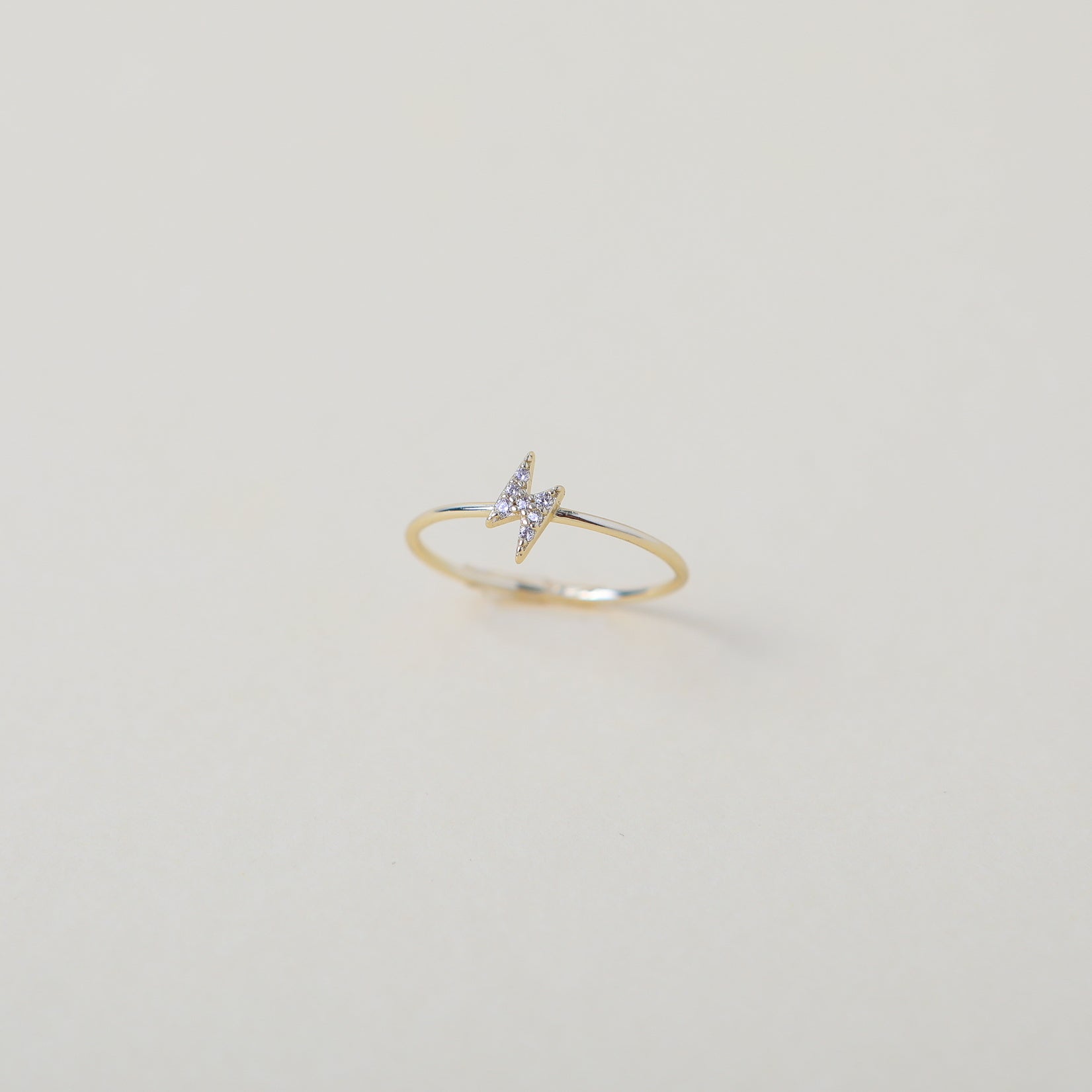 gold crystal accented lightening bold ring