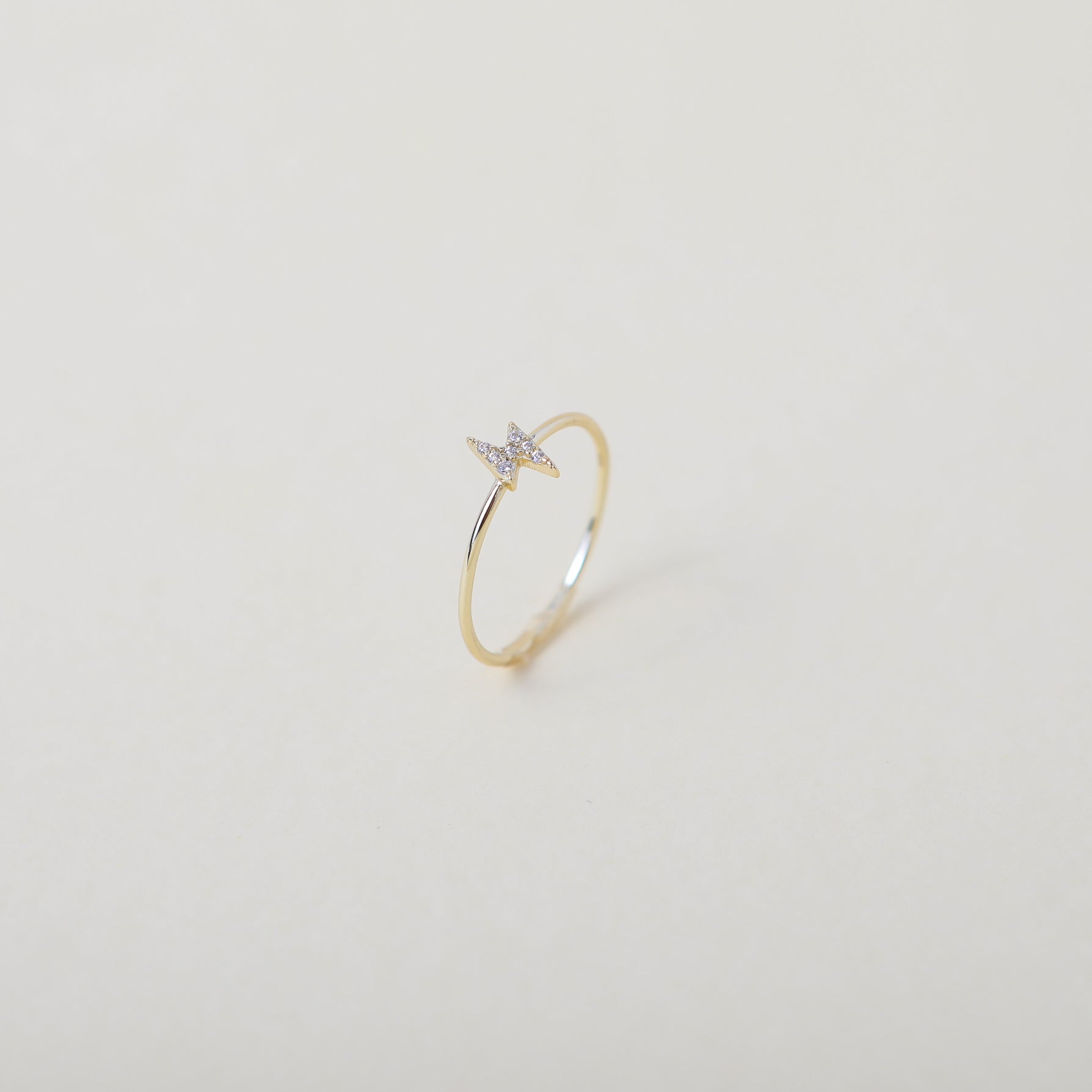 gold crystal accented lightening bold ring