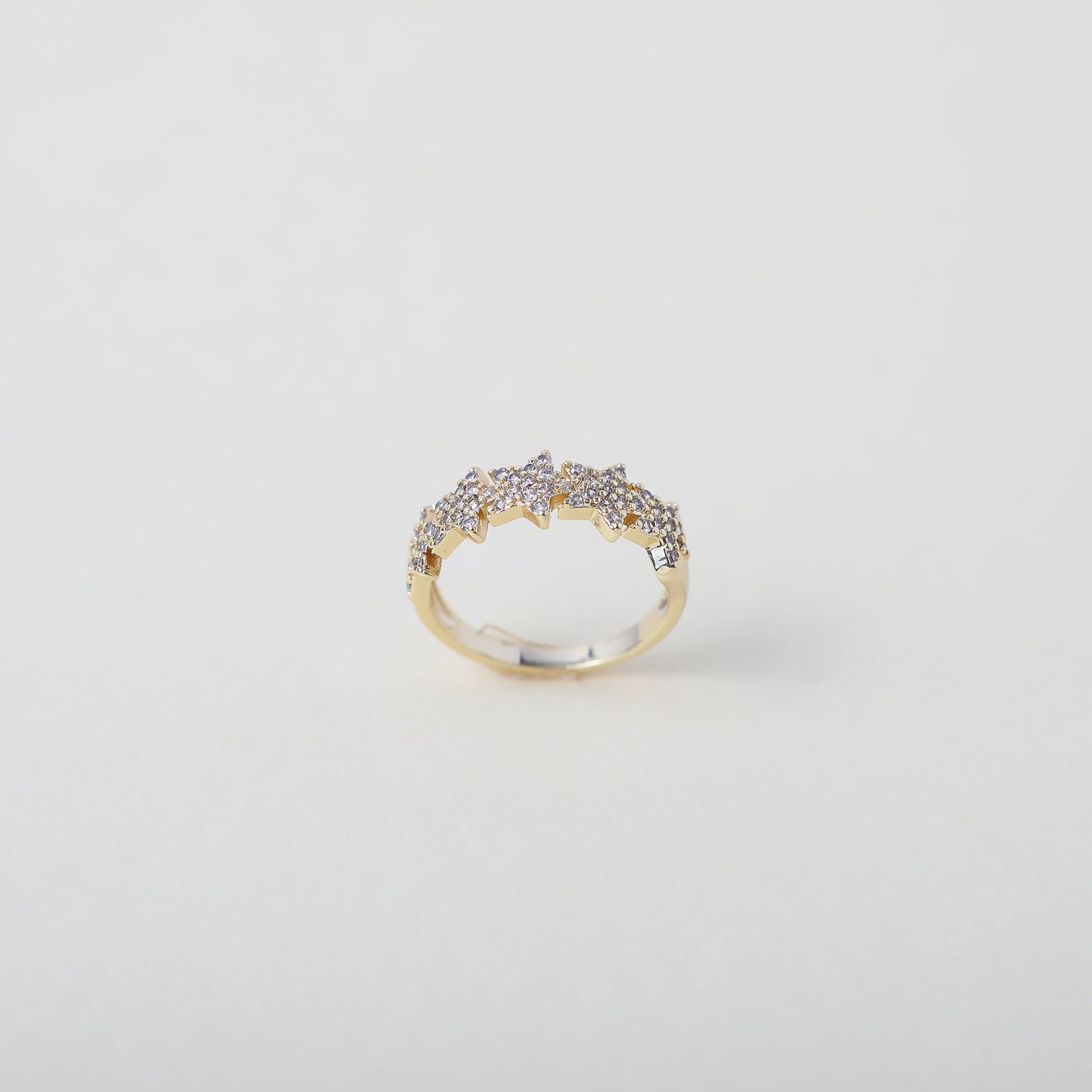 Crystal accented gold star ring