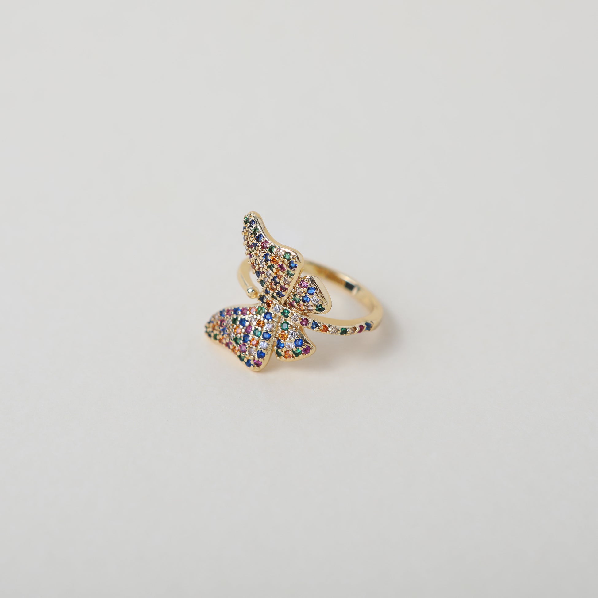 Adjustable butterfly ring with rainbow crystal embellishments