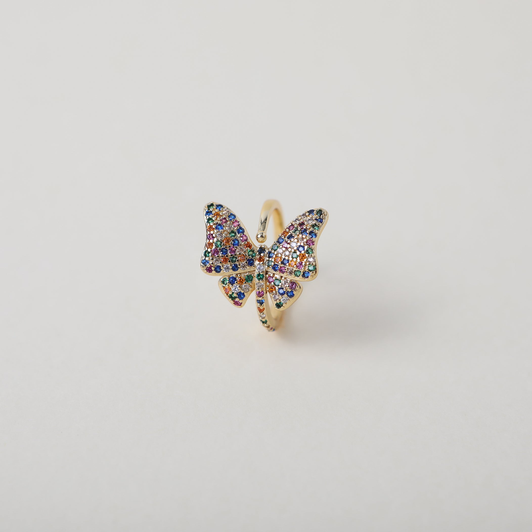 Adjustable butterfly ring with rainbow crystal embellishments