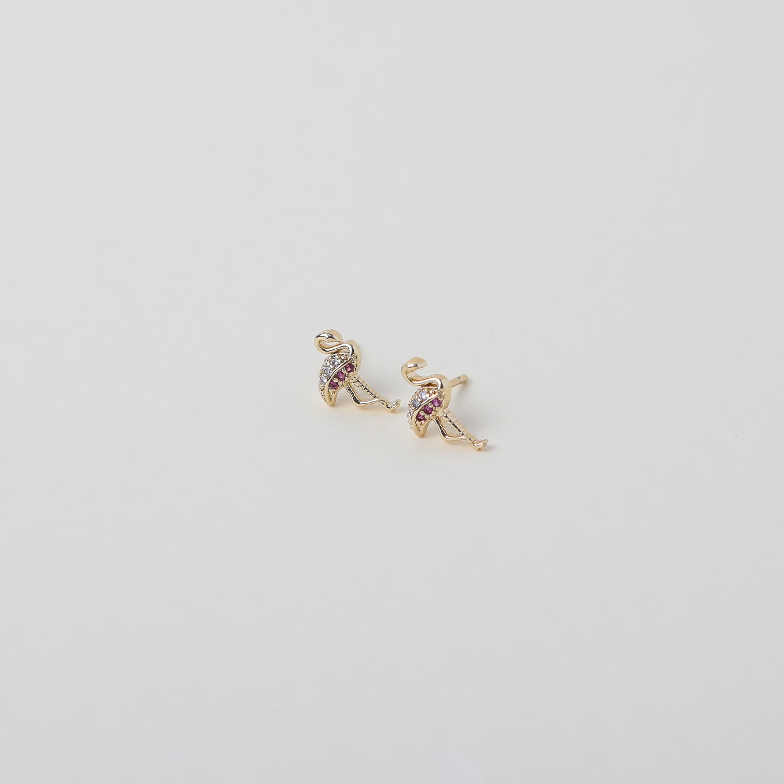 gold flamingo studs with pink crystal accents
