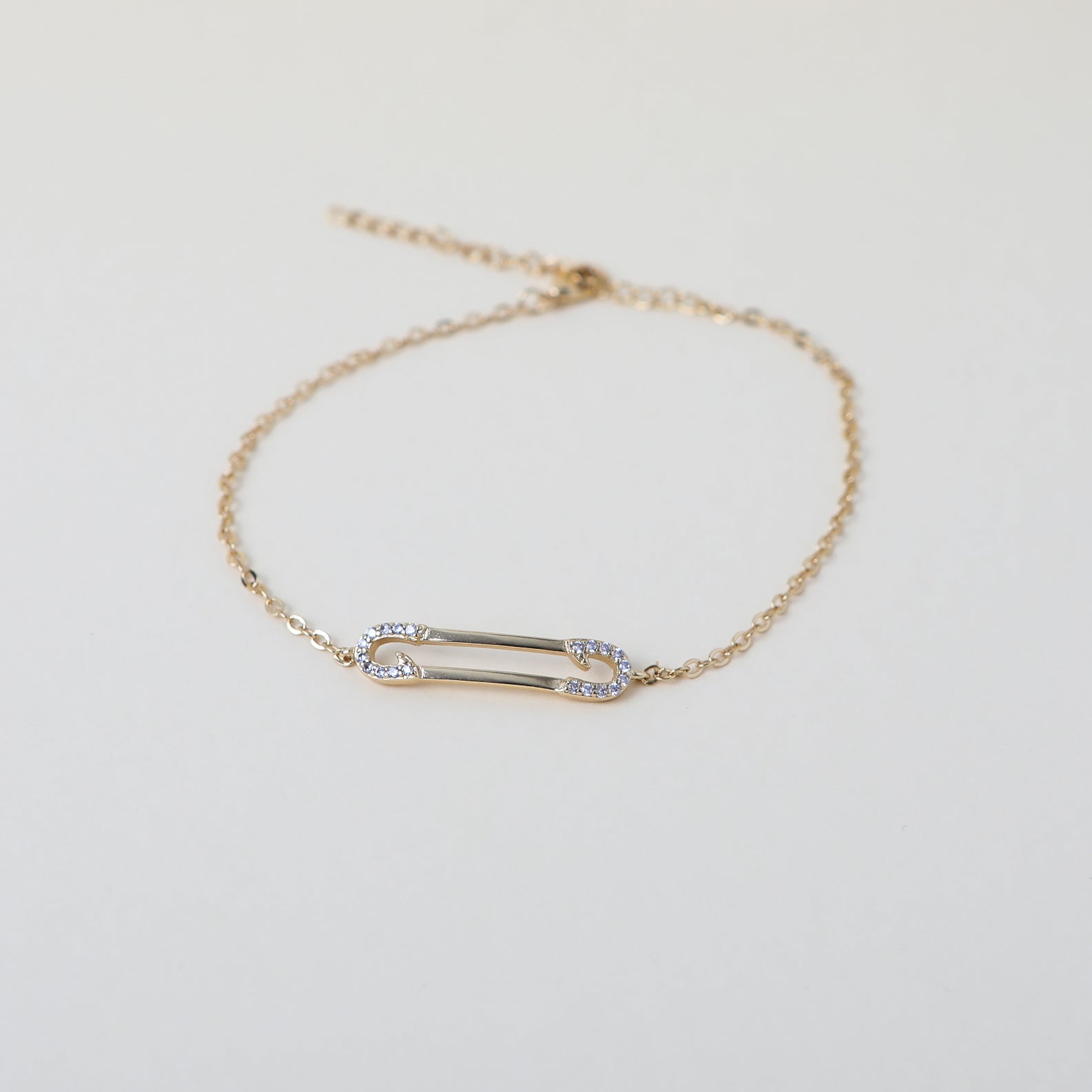 crystal accented gold paperclip bracelet