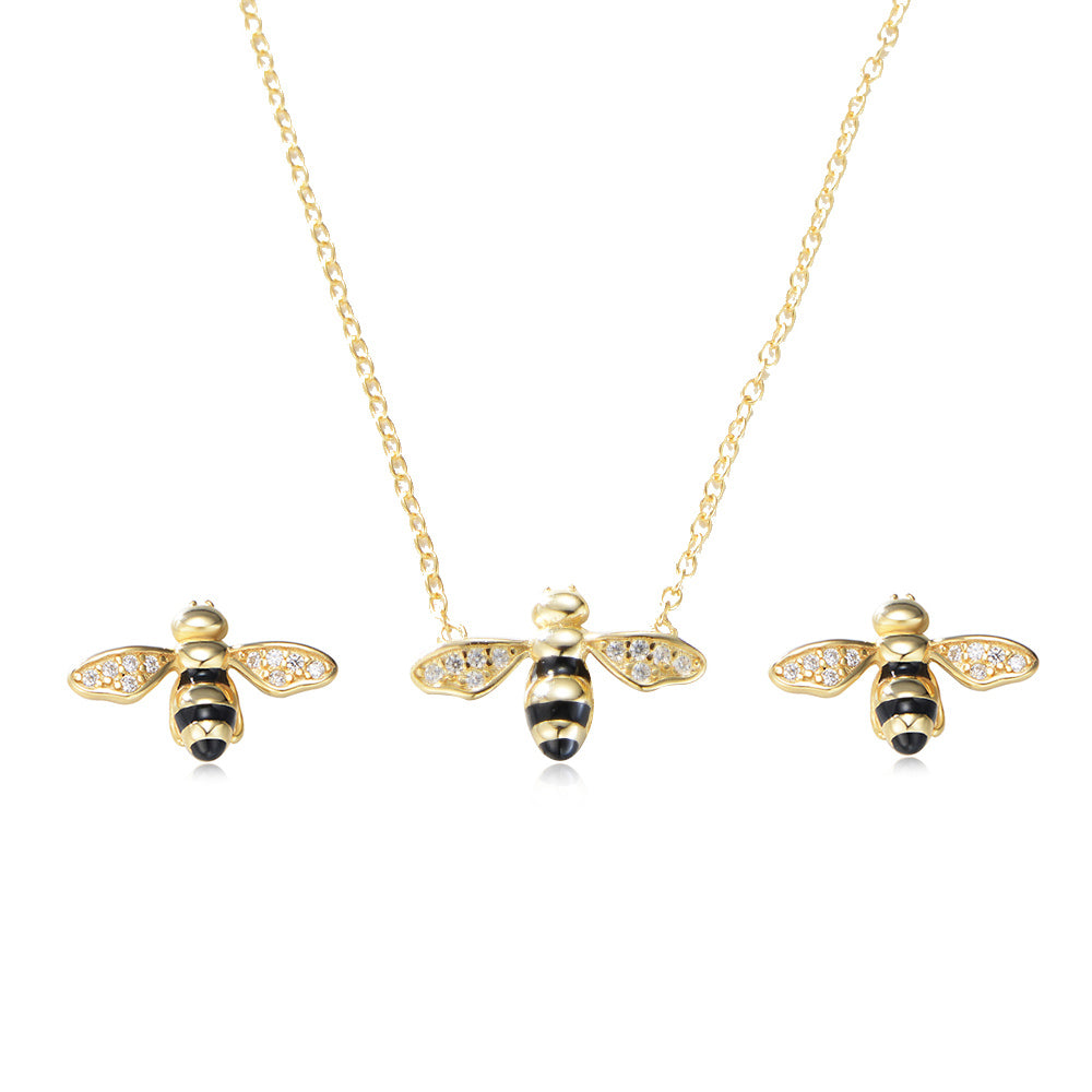 Gold chain with gold and crystal accented honey bee pendant and earring set