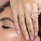 gold open claw twisted serpent ring with crystal eyes