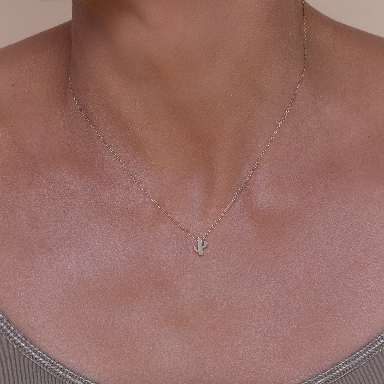 delicate Gold chain and cactus pendant