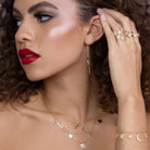 Gold thread through chain earrings with small hoop detail