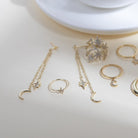 Gold Double chain star and moon drop earrings with gold moon and crystal embellished star