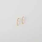 Crystal accented gold lunar ear cuffs