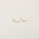 Crystal accented gold lunar ear cuffs
