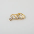 Stackable gold and crystal accented safety pin rings