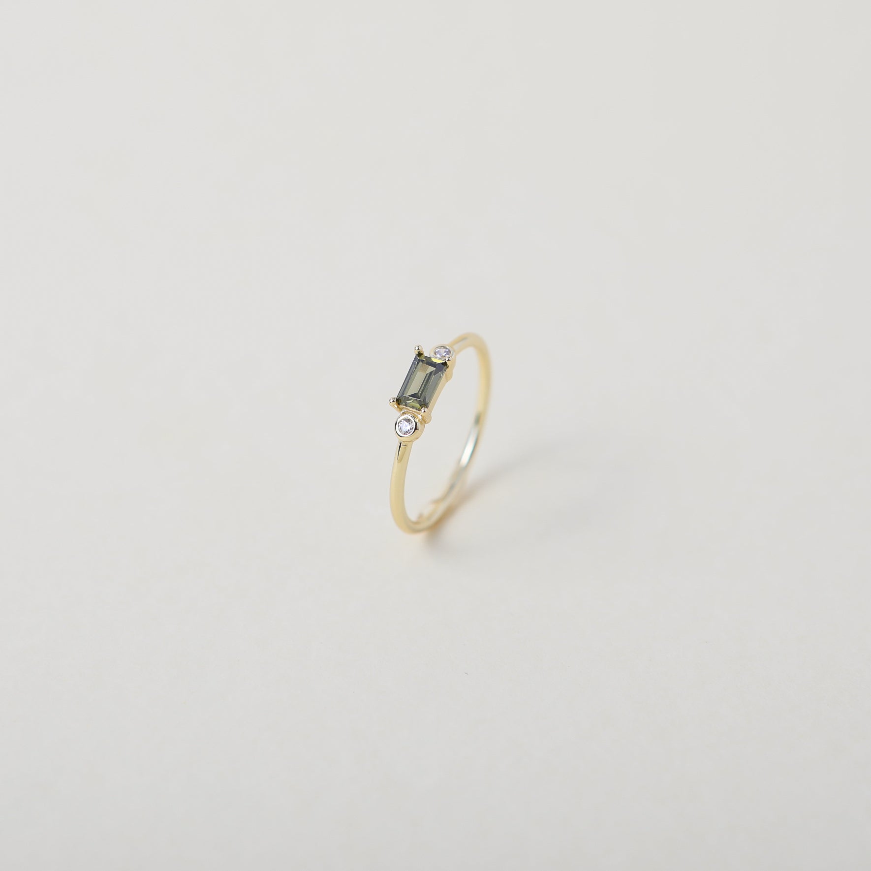 peridot coloured crystal and gold ring
