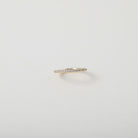 Crystal accented gold eternity ring