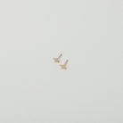 Micro gold lightening bolt studs with crystal accents