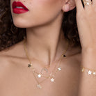 Gold charm necklace with lobster clasp